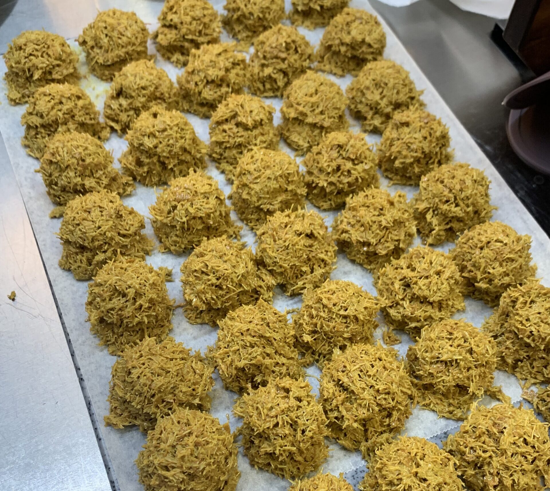 Dubai Chewy Cookie pistachio kadayif filling shaped into balls before coating