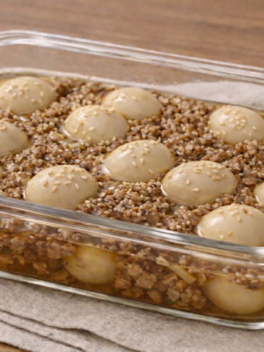 Baby quail egg jangjorim with ground beef in a light soy-style broth